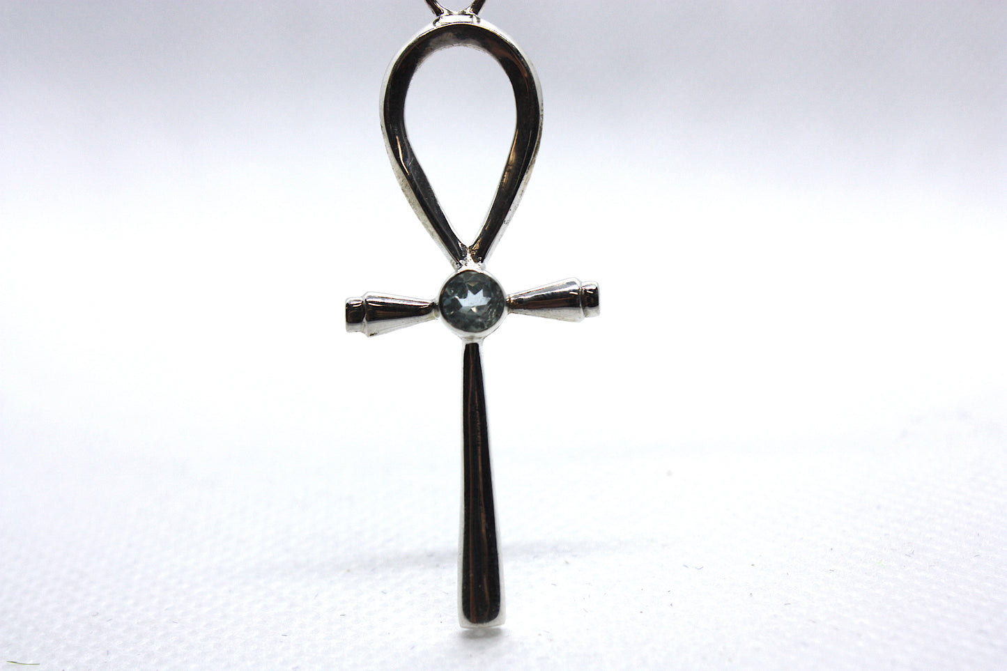 Blue Topaz Sterling Silver Cross Symbol Pendent